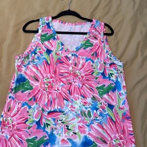 Pink flowers blue, green sleeveless button detail but does not open